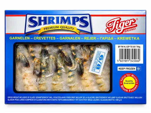 Block-frozen black tiger prawns, headless and shell-on, grade 6/8. Tiger Brand.